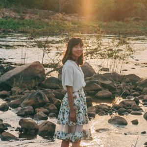 Serene Cheng beside a river